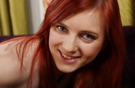 Hot redhead chick Shelby digs her insatiable leaking cunt with a dildo toy