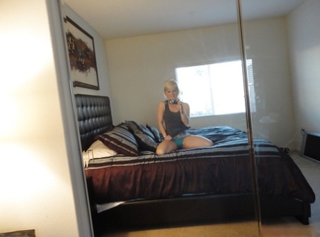 18 year old blonde teen Ash Hollywood taking nude self shots in mirror