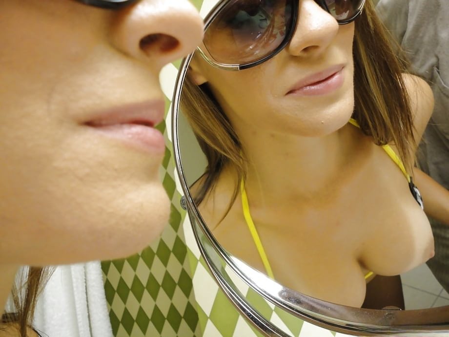Sunglass wearing ex-gf Mandy Haze snapping selfies of her nice tits in mirror