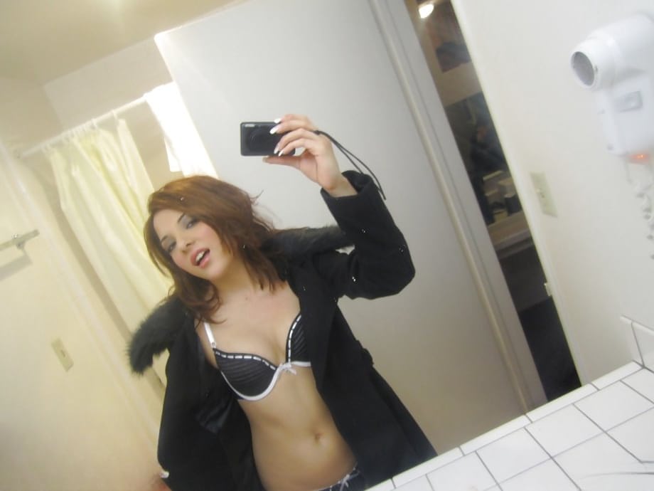Sexy ex-girlfriend Evilyn Fierce taking selfies while stripping down to thong