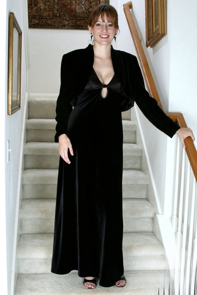 Classy mature lady Justine plays with her wide open pussy on staircase