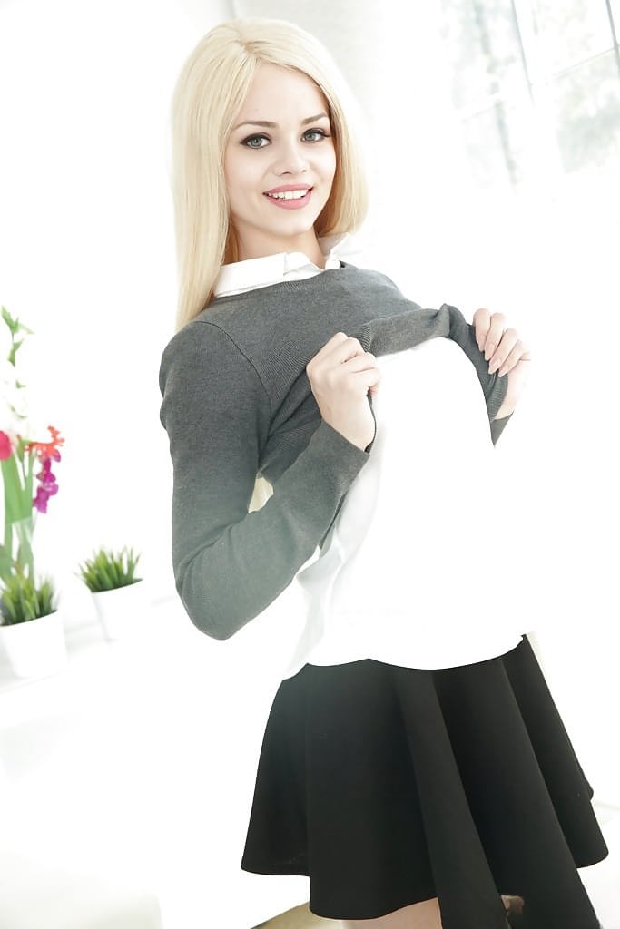 Cute blonde amateur Elsa Jean stripping down to over the knee socks
