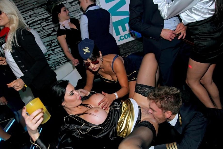 Shameless girls enjoy a clothed sex action at a club party and fuck like sluts