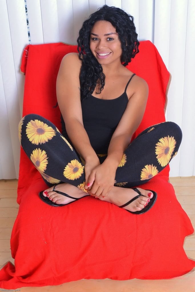 Black first timer Millie Stone smiling while showing her pink pussy