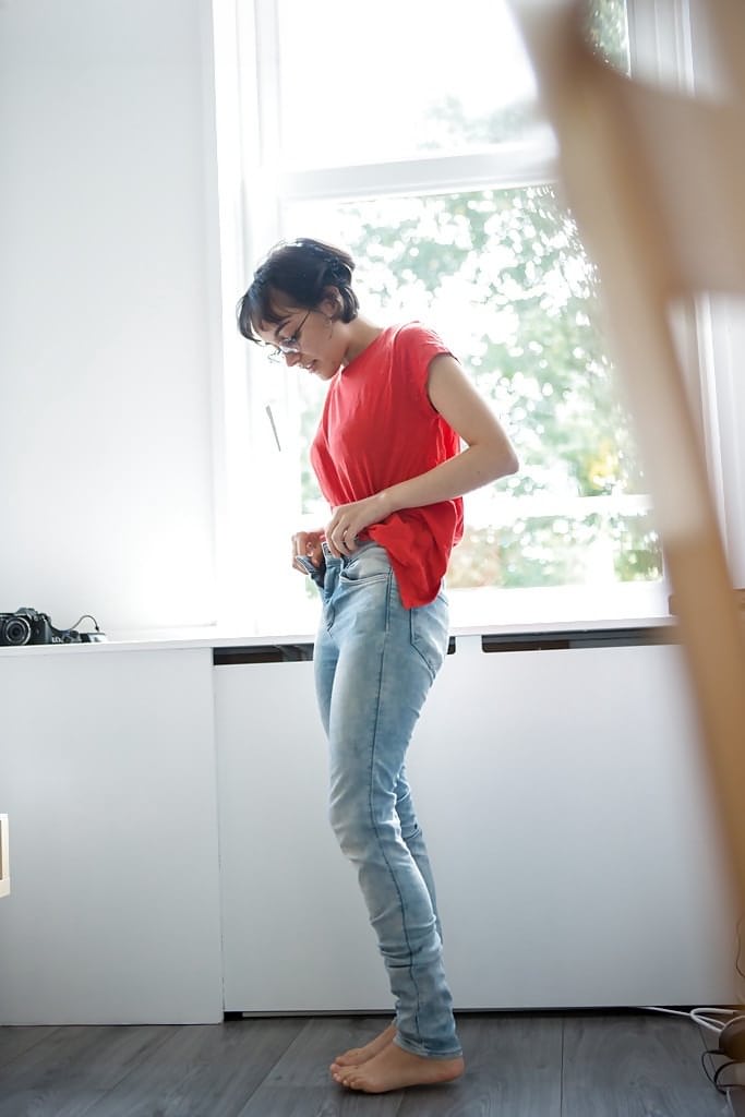 Skinny nerd Yasmeena pulling panties and jeans on while getting dressed