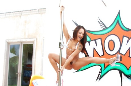 Latina teen Holly Hendrix showing off bare ass before working stripper pole