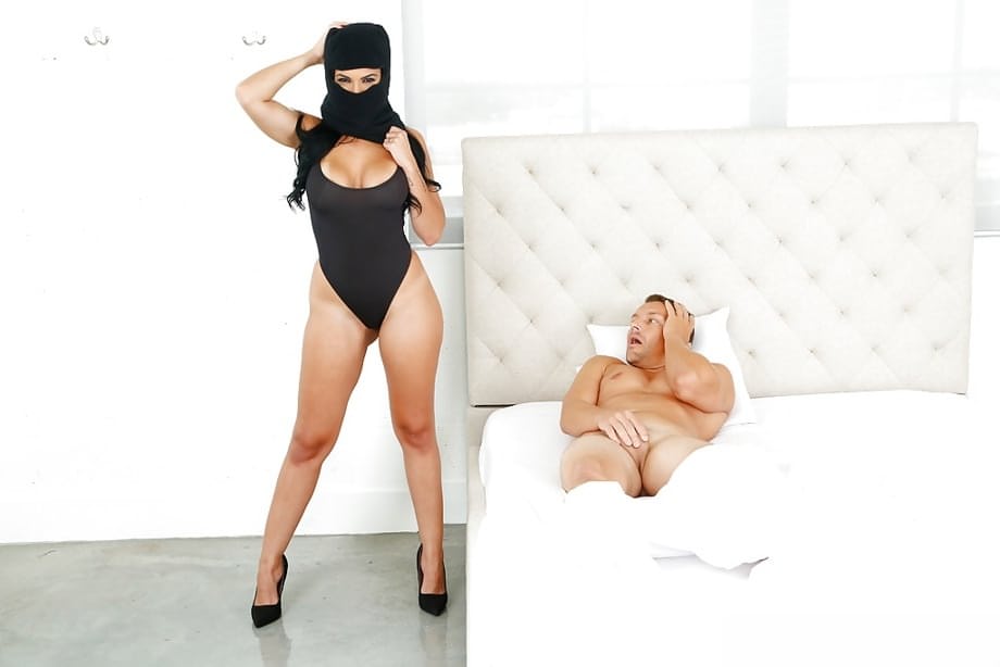 Hijab attired female Dylan Daniels giving large cock oral sex