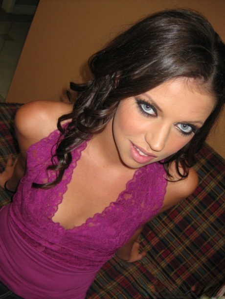 Amateur girlfriend Missy Stone smoking and posing with her legs spread