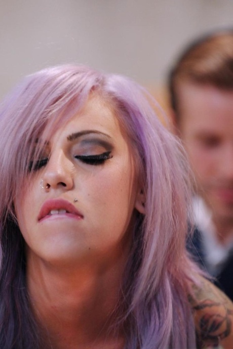 Hot emo model in black stockings is guided thru an anal fuck by a sex machine