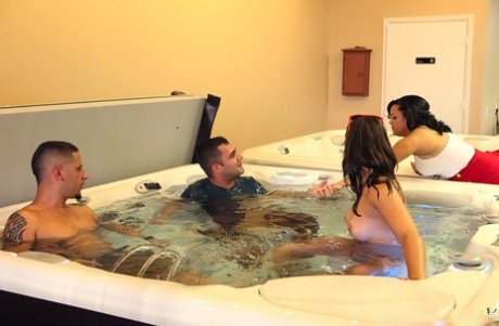 Amateur female is stripped naked for sex games in a hot tub