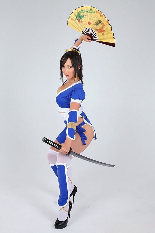 Asian solo model releases her big tits from her cosplay costume