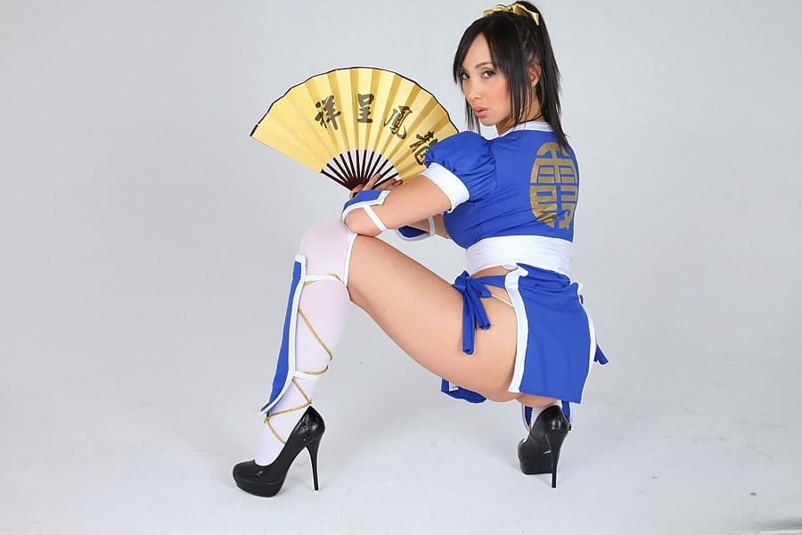 Asian solo model releases her big tits from her cosplay costume