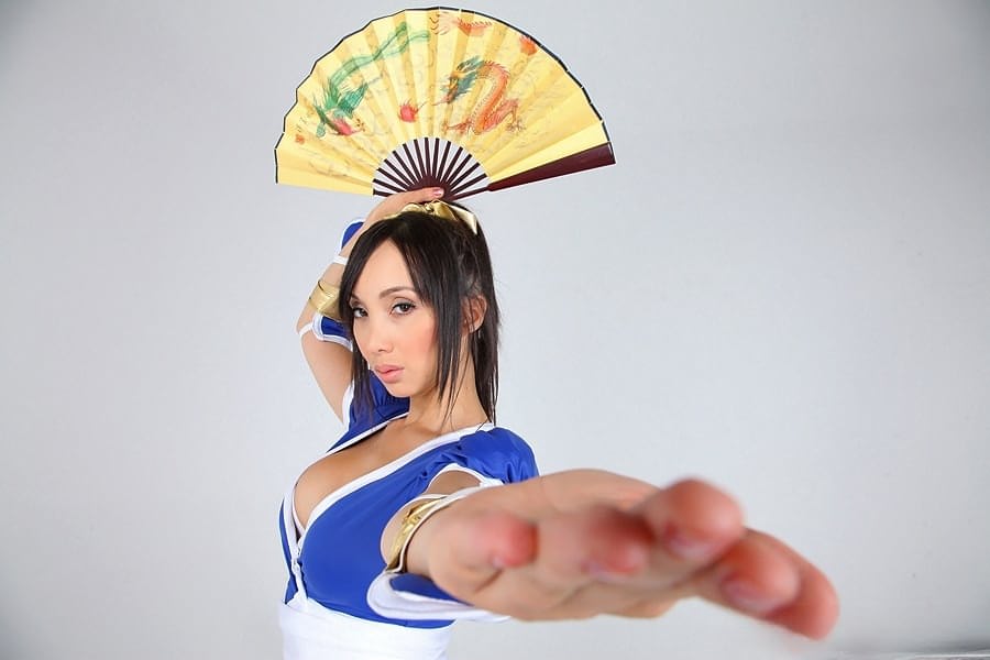 Asian solo model releases her big tits from her cosplay costume