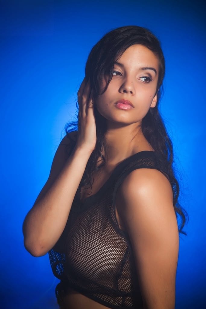 Indian female models non nude in a see thru top and shorts