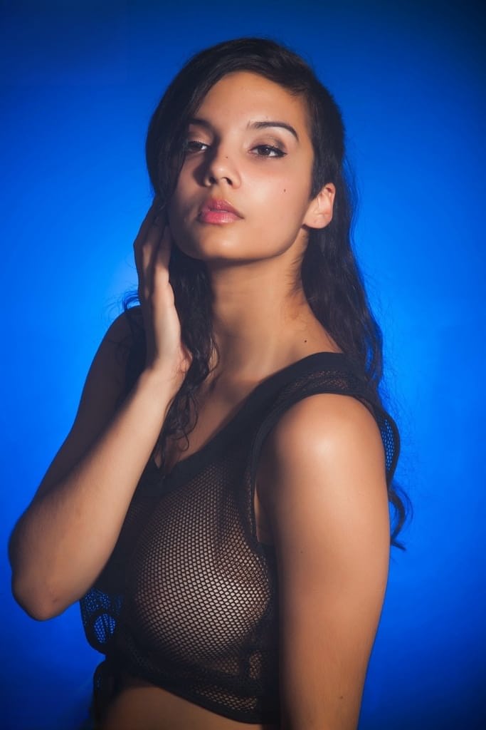 Indian female models non nude in a see thru top and shorts