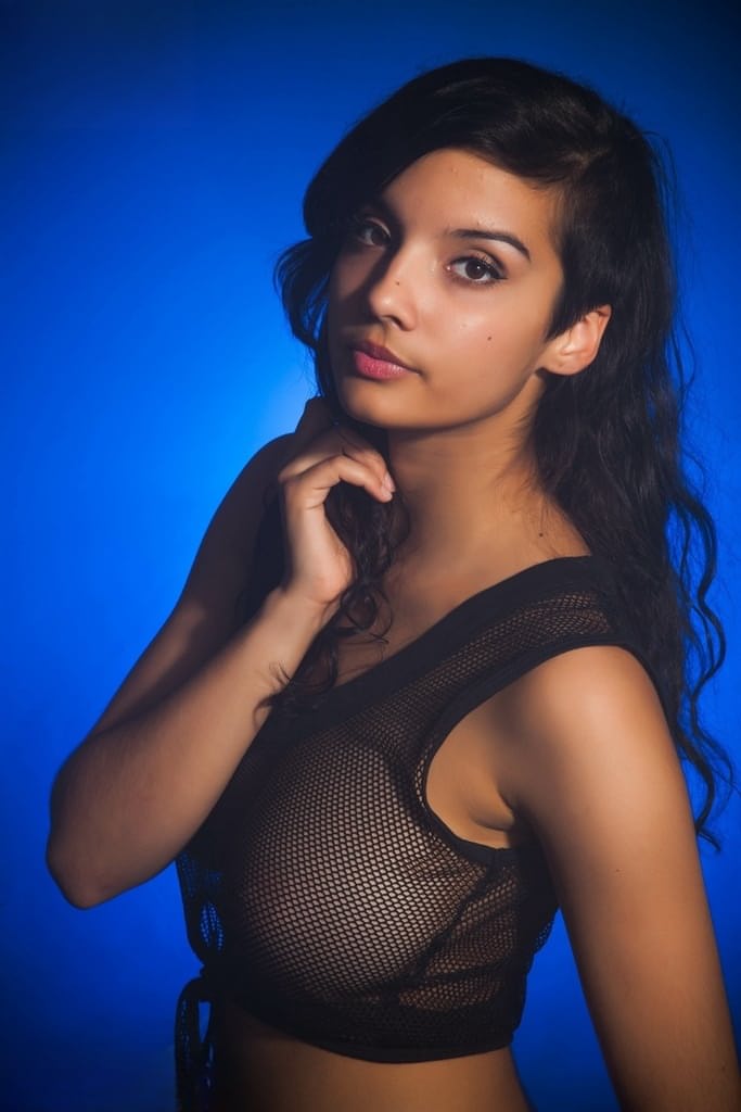 Indian female models non nude in a see thru top and shorts