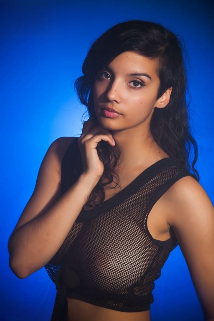 Indian female models non nude in a see thru top and shorts