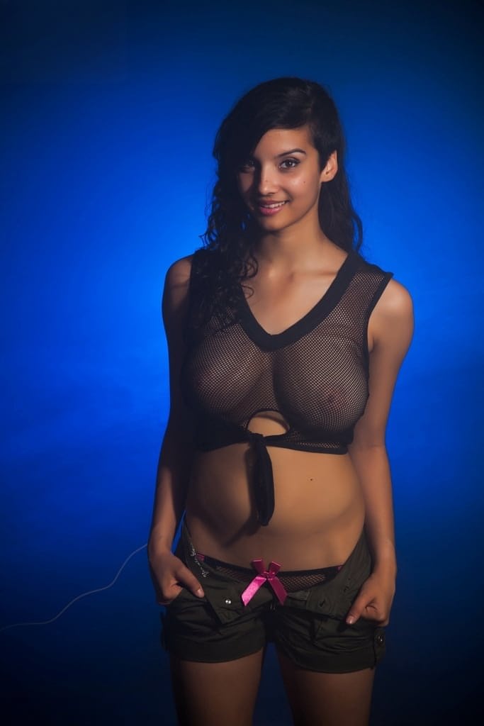 Indian female models non nude in a see thru top and shorts