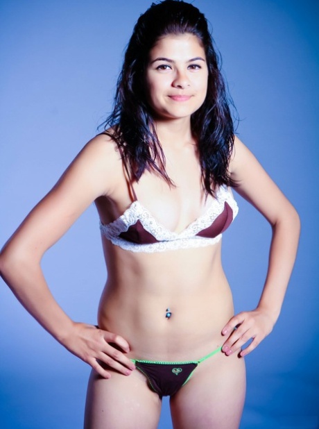 Desi solo girl models her matching bra and panty set in her bare feet