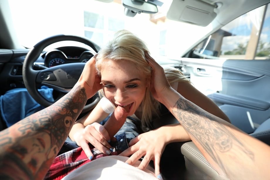 Blonde girl Anastasia Knight gives a blowjob inside a parked car