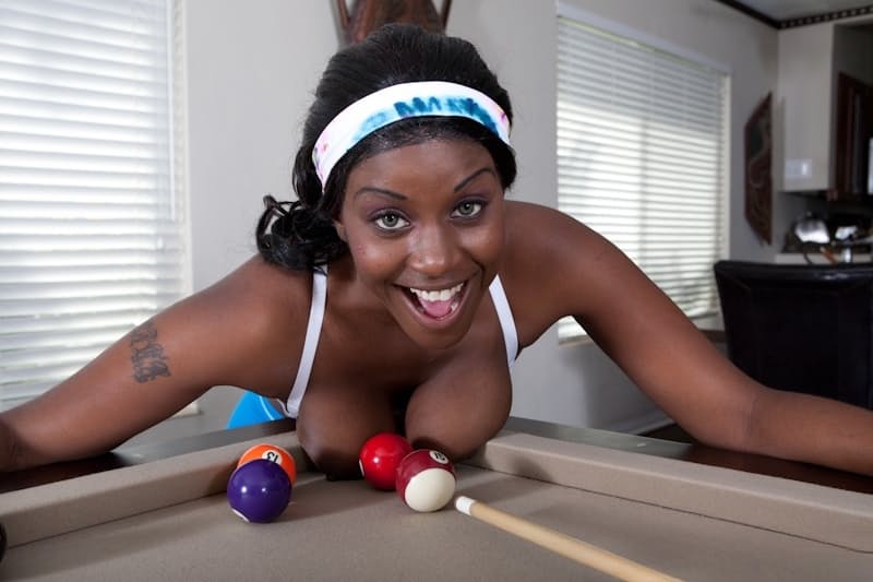 Busty black girl spreading her brown pussy on the pool table