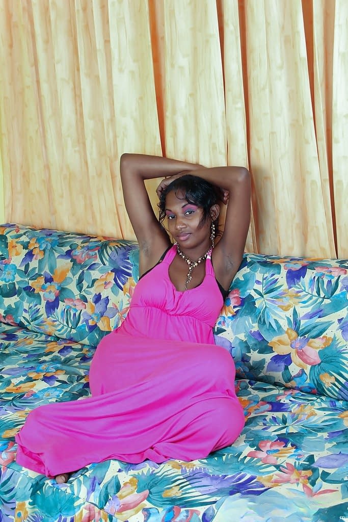 Lovely Indian busty babe Sunita stripping and spreading her legs