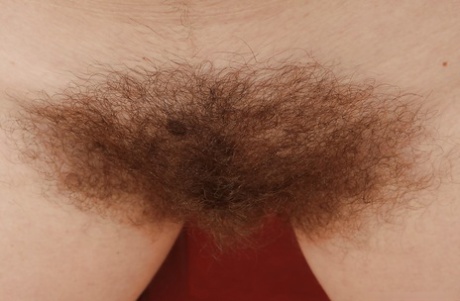 Fatty woman Erin Eden exposing her big tits and hairy bush