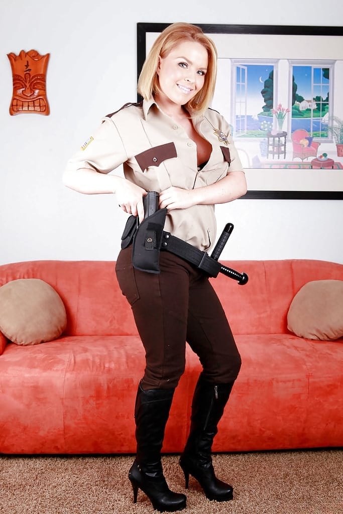 Hot babe in police uniform Krissy Lynn stripping and spreading her legs
