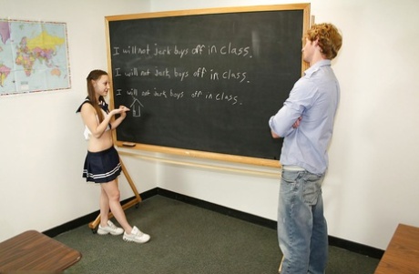 Fully clothed naughty schoolgirl jerking off a stiff prick