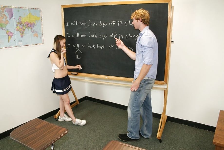 Fully clothed naughty schoolgirl jerking off a stiff prick