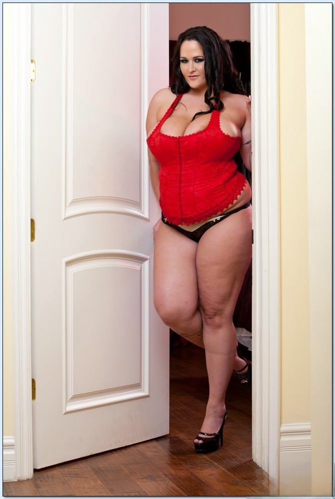 BBW wife Carmella Bing stripping from red corset and squeezing big tits
