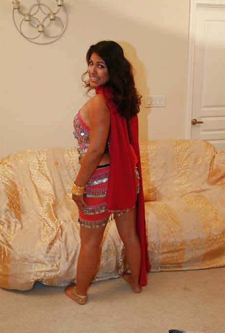 Chubby indian chick uncovering her nice jugs and shaggy pussy