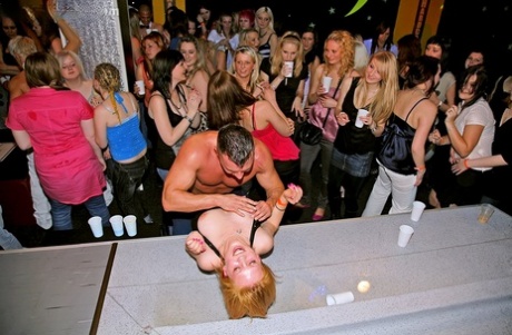 Slutty amateur gals showcasing their blowjob skills at a crazy party