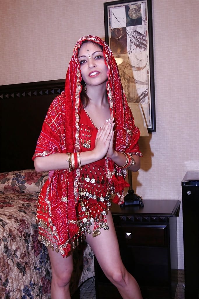Foxy indian chick with slender legs uncovering her tiny tits