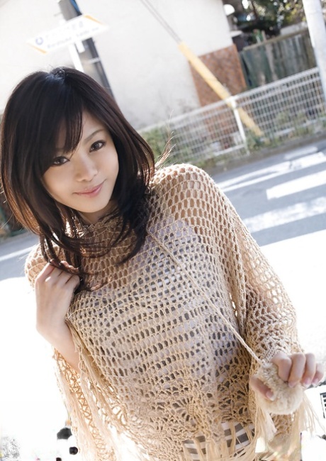 Sweet asian teenage babe China Yuki revealing her tempting body