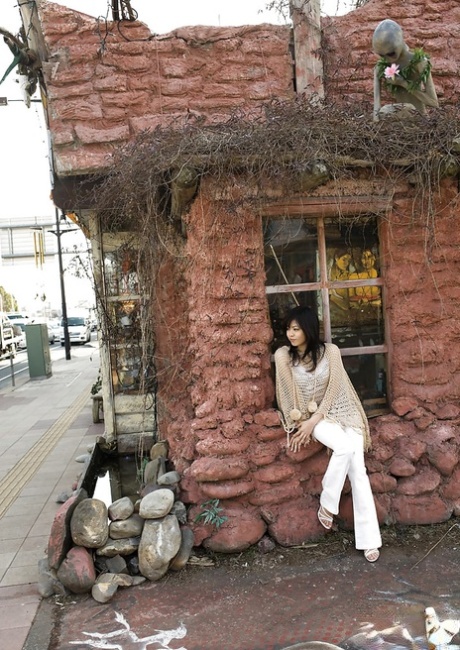 Sweet asian teenage babe China Yuki revealing her tempting body