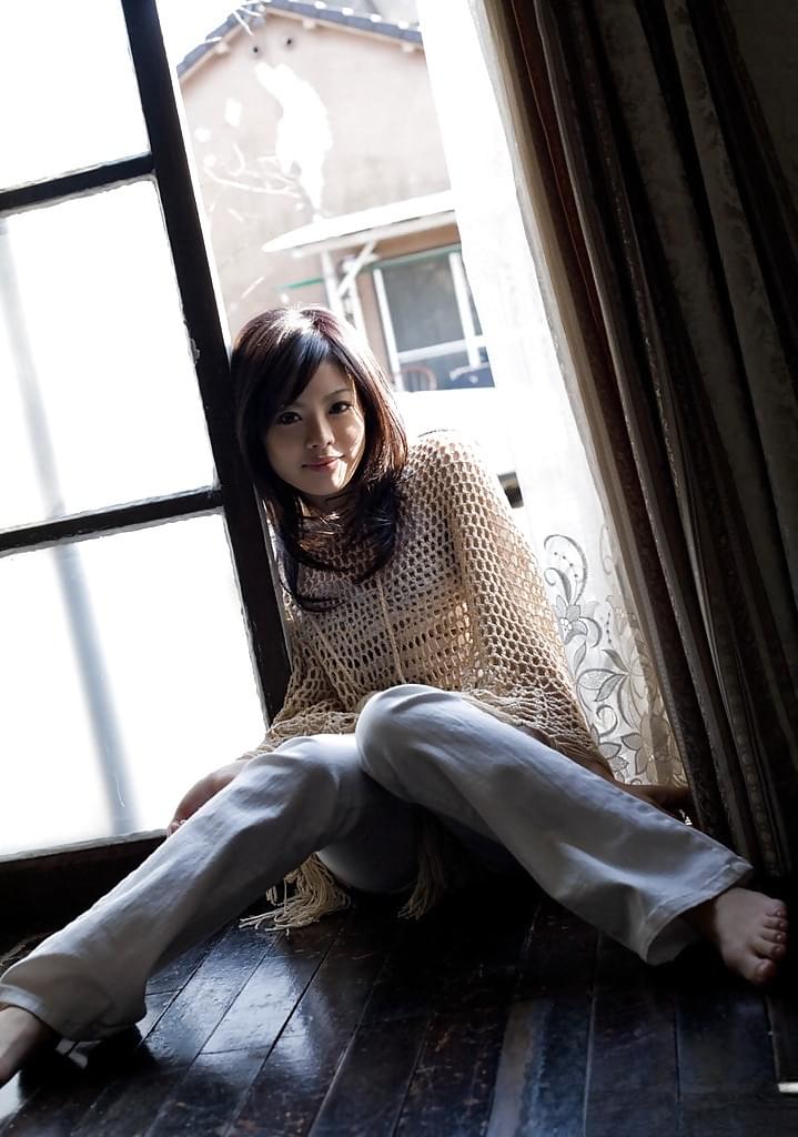 Sweet asian teenage babe China Yuki revealing her tempting body