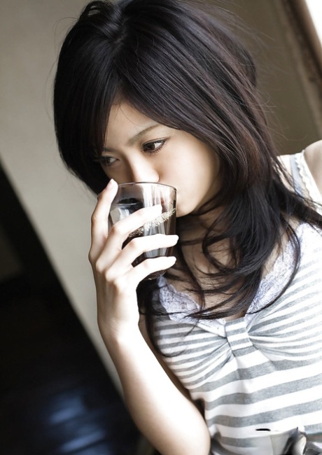 Sweet asian teenage babe China Yuki revealing her tempting body