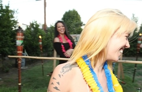 Busty Addison Grey gets involved in sexy limbo competition outdoor
