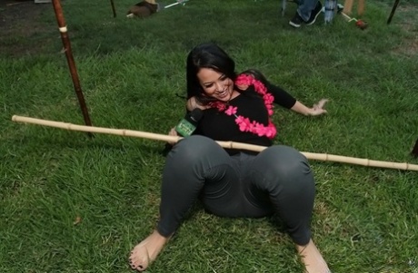 Busty Addison Grey gets involved in sexy limbo competition outdoor