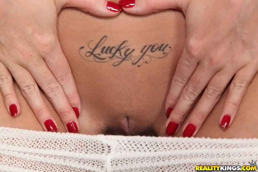 Hot babe with shaved slit Paige Turnah stripping and spreading her legs
