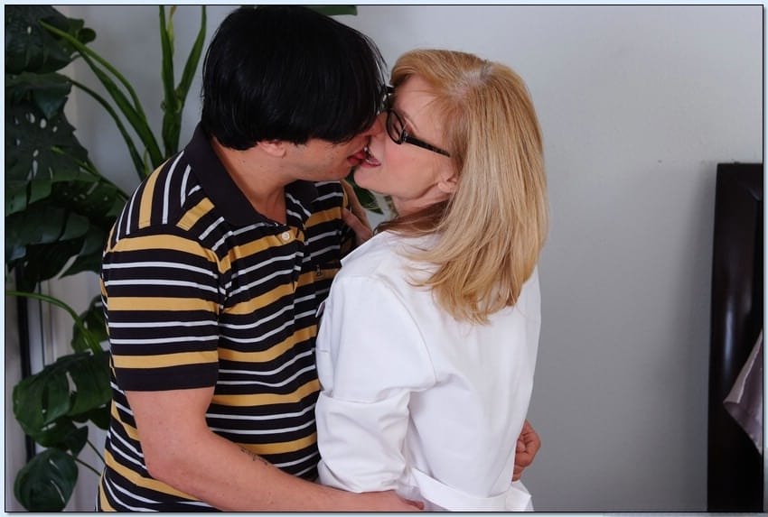 Big titted mom in glasses Nina Harley stripped to stockings and fucked