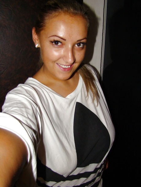 Chubby teenage blonde with massive melons stripping and picturing herself