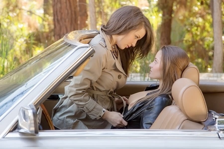 Sexy chick Dani Daniels making out with her lesbian friend outdoors