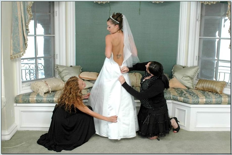 Busty blonde Nikki Benz helping Penny Flame to try on wedding dress