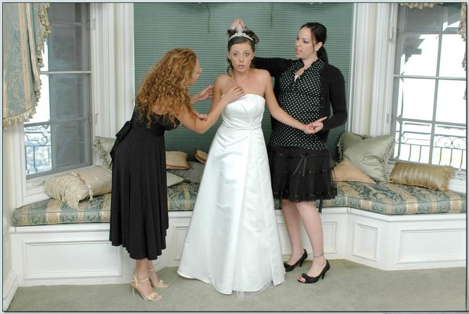 Busty blonde Nikki Benz helping Penny Flame to try on wedding dress