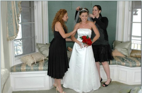 Busty blonde Nikki Benz helping Penny Flame to try on wedding dress