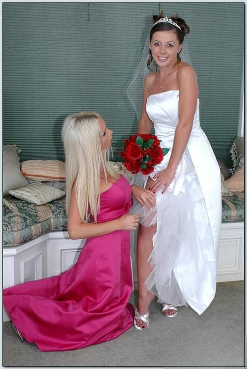 Busty blonde Nikki Benz helping Penny Flame to try on wedding dress