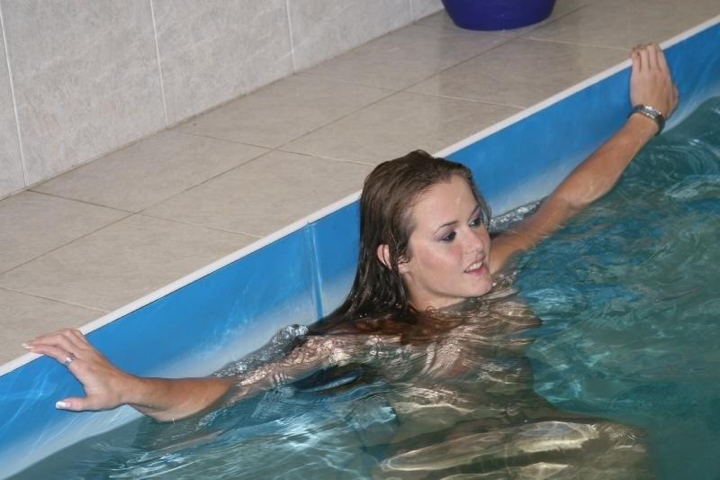 Sexy babes enjoy a pool party turning into a fervent groupsex
