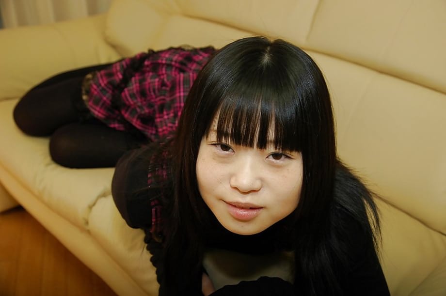 Playful asian schoolgirl Rio Takei getting rid of her clothes